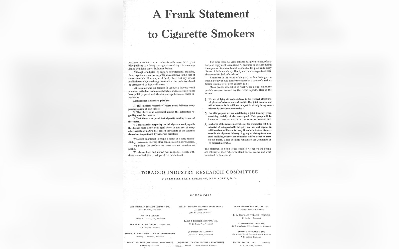 A full broadsheet newspaper page showing the 1954 Frank Statement advertisement, flat on a light surface, the Tobacco Industry Research Committee signatures visible at the bottom