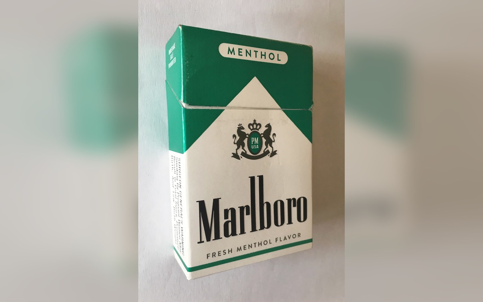A green and white Marlboro Menthol cigarette pack with no visible health warnings