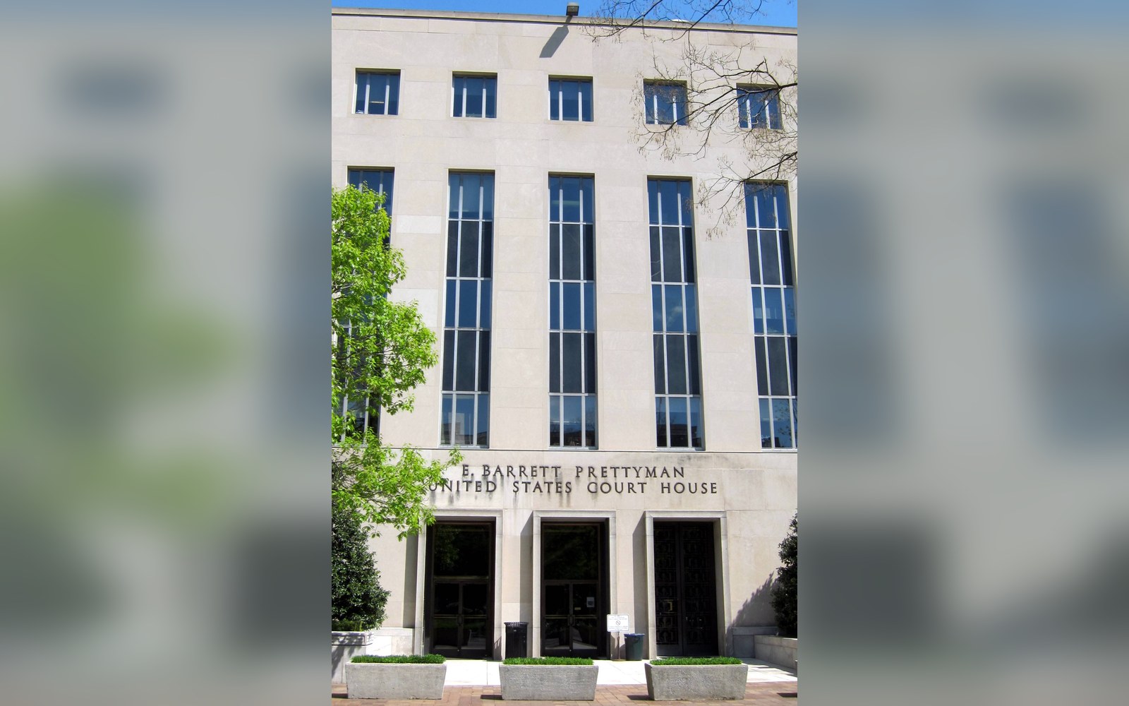 Facade of the E. Barrett Prettyman United States Court House with tall vertical windows